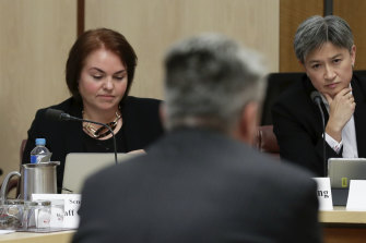 Senator Kimberley Kitching and Senator Penny Wong in a Senate estimates hearing.