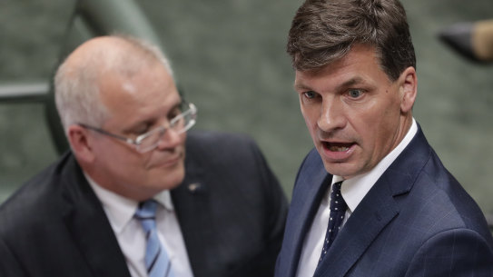 Energy and Emissions Reductions Minister Angus Taylor (right) with Prime Minister Scott Morrion. Mr Taylor has argued Australia will 'meet and beat' Paris carbon goals, but much of the reduction may come from the use of so-called carryover credits from the Kyoto Protocol period.