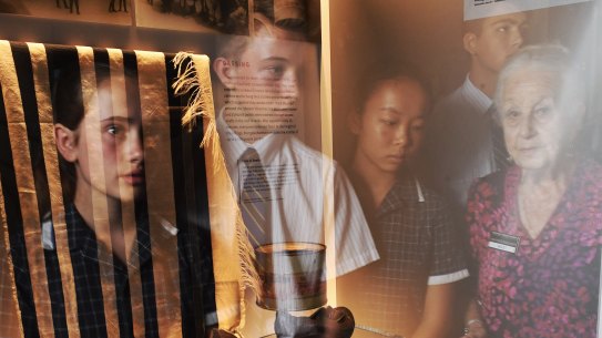 Auschwitz survivor Olga Horak OAM speaks to high school students from Northern Beaches St Luke’s as they view the new display items of genuine Auschwitz artefacts at the Sydney Jewish Museum.