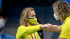 Ariarne Titmus and Dean Boxall at the Olympics, now spruiking for BoQ.
