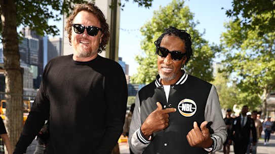 Former Chicago Bulls Luc Longley and Scottie Pippen walk along the Yarra River on Thursday.