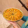 Carrot slice triangle baklava with pistachio.