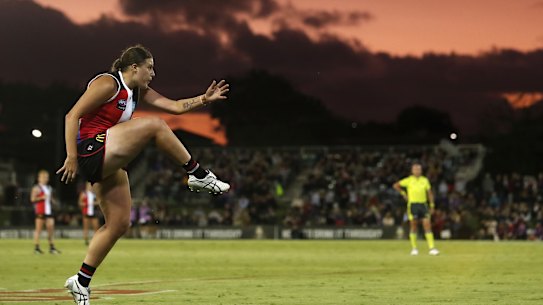 Caitlin Greiser kicks a goal for the Saints in the AFLW win over Melbourne.