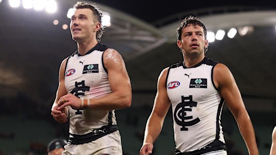 Skipper Patrick Cripps leads his Carlton team off the Adelaide Oval after the Gather Round loss to the Crows.