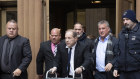 Harvey Weinstein leaves court following a hearing, on December 11 in New York.