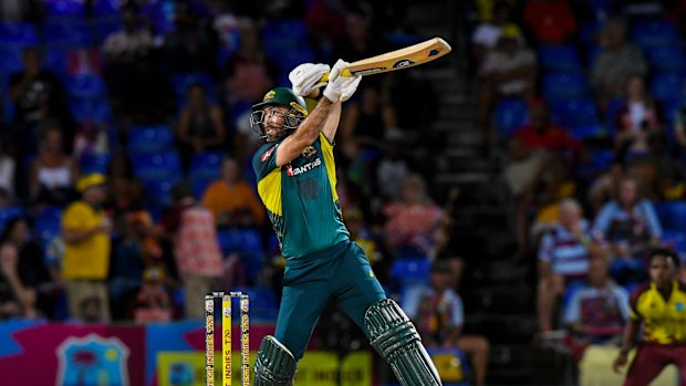 Glenn Maxwell hits a six during the fourth T20 international cricket match between West Indies and Australia in St Kitts.