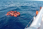Crew pull survivors from a passenger ferry Putri Yasmin that caught fire.