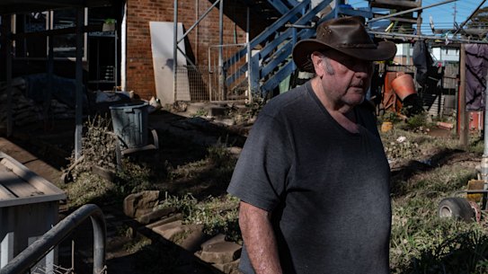 Martin Knibbs surveys his flooded home in Windsor, on the Hawkesbury, on Saturday.