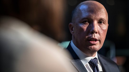 Peter Dutton intervenes in au pair visa case connected to AFL boss Gil McLachlan