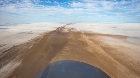 The first of the floodwaters entering Warburton Groove in Kati Thanda-Lake Eyre on Tuesday.