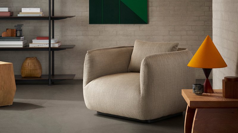 Bold, contemporary furniture highlights how side tables and sofas transform rooms