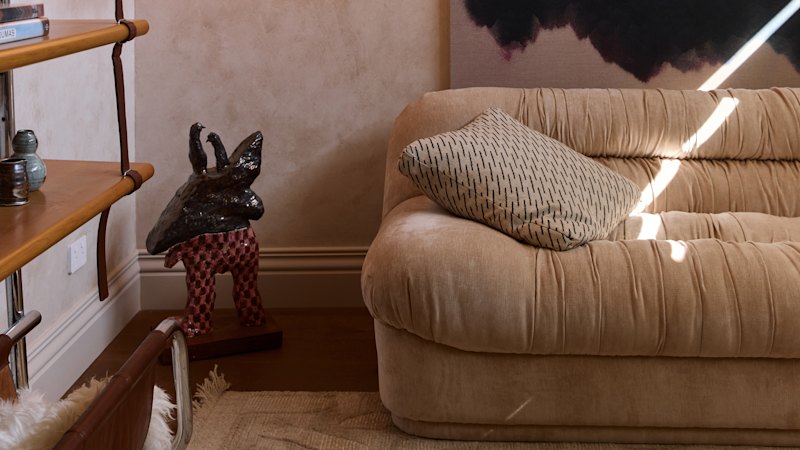 Home styling advice: use warm lighting and plush furniture for instant softness