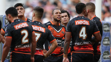 The Tigers assume a familiar position behind their own posts during Sunday’s loss to Manly.