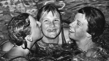 Teenage rampage ... Shane Gould is congratulated by Gail Neall (left) and Narelle Moras after setting her fourth world record.