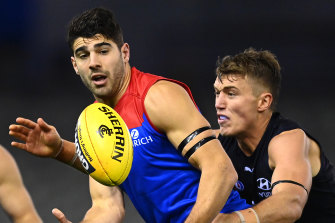 Christian Petracca, left, and Patrick Cripps, right, in action during Saturday night's thriller. 