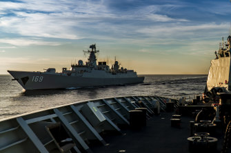 A Chinese frigate and a guided missile destroyer on manoeuvres in the South China Sea in 2020