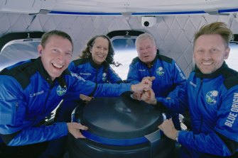 Glen de Vries (far left) travelled into space with William Shatner (second from right) last month.
