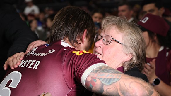 Cameron Munster hugs his mother, Deborah, after the Origin decider.