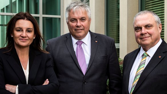 Senator Jacqui Lambie with Centre Alliance senators Rex Patrick and Stirling Griff at Parliament House.
