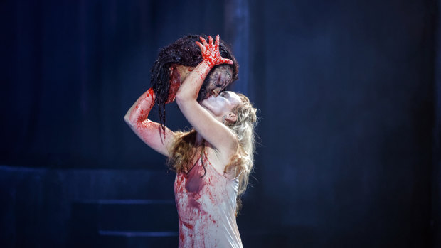 Victorian Opera's Salome, Vida Mikneviciute gets up close and personal with John the Baptist.