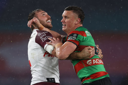 Jack Wighton takes a carry against Manly on Saturday night.