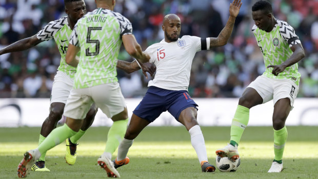 England's Fabian Delph duels for the ball with Nigeria's Oghenekaro Etebo (right).