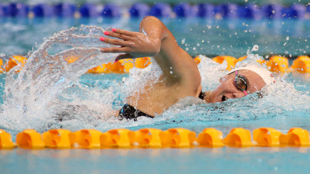 No limits: Ariarne Titmus churns through the water en route to winning and equalling her Australian and Commonwealth record in the women's 400m freestyle final.