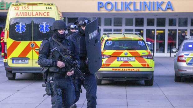 Police outside the Ostrava Teaching Hospital after a mass shooting.