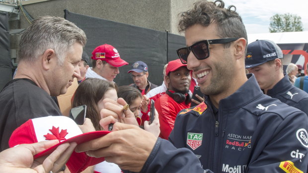 All smiles: Daniel Ricciardo will be left smiling over reports he is to be offered $20m each year if he makes a switch to McLaren.