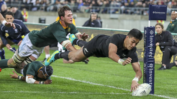 Twinkle toes: Rieko Ioane dives over out wide to bring New Zealand within touching distance of South Africa.