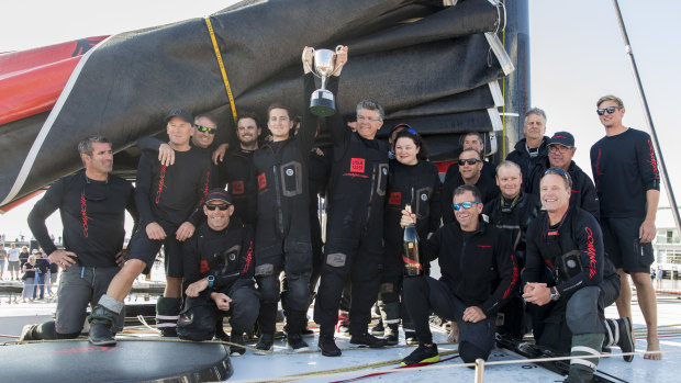 The crew of supermaxi Comanche celebrate line honours in the 2019 Sydney to Hobart.