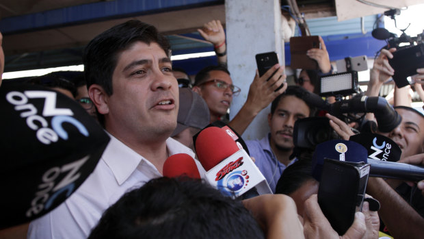 Successful presidential candidate Carlos Alvarado talks to the press after voting in the presidential runoff election in San Jose, Costa Rica, on Sunday, 