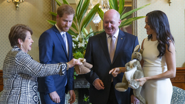 Australian Governor-General Sir Peter Cosgrove  and his wife Lady Cosgrove present a toy kangaroo and a pair of small ugg boots to Prince Harry and his wife Meghan for Baby Sussex, now Archie Harrison Mountbaten-Windsor.
