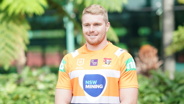 Newcastle Knights forward and former miner Josh King wearing the hi-vis NSW Mining jersey before their match against the Dragons.