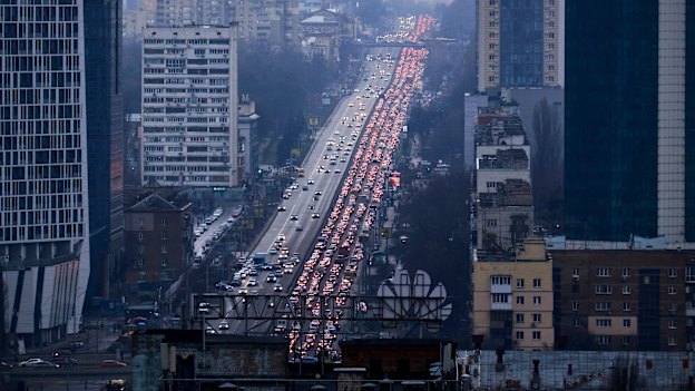 Cars stream out of Kyiv on February 24, following missile strikes by Russian forces on Ukrainian territory.