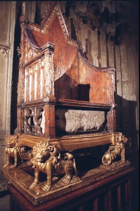 The ancient Stone of Scone beneath the Coronation Chair in London’s Westminster Abbey.