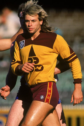 Bearing it: Capper during his short stint with Brisbane.
