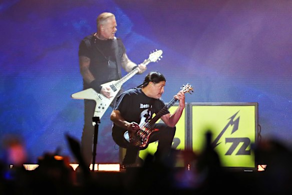 James Hetfield (left) and bassist Robert Trujillo of Metallica perform onstage during the band’s M72 World Tour at Marvel Stadium on November 8, 2025