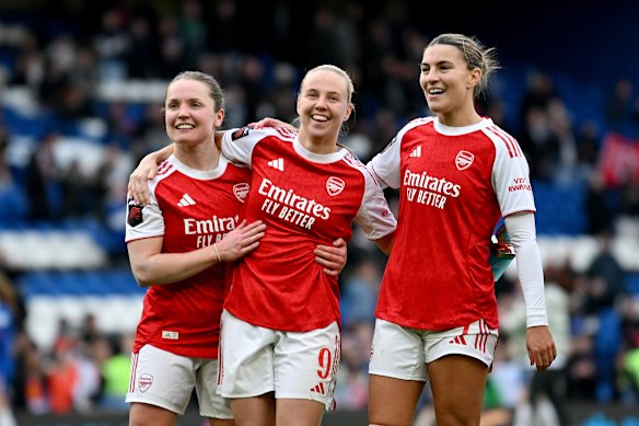 Beth Mead, Kim Little and Steph Catley celebrate Arsenal’s win.