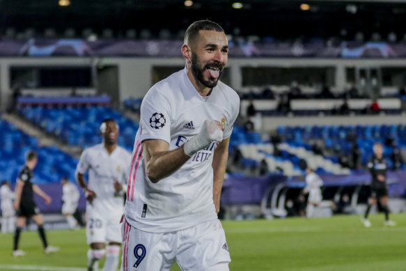 Karim Benzema celebrates the second goal of his first-half double for Real Madrid.