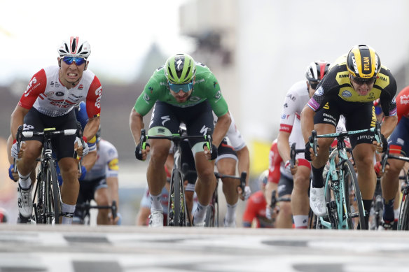 Top shelf: Caleb Ewan, left, Peter Sagan, centre, and Dylan Groenewegen, right, fight it out at the Tour de France. 