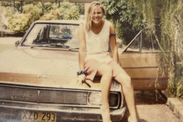 Margaret Hickey and the brown Valiant that took her “down to Perth, up to Broome and across to Darwin”, circa 1990.