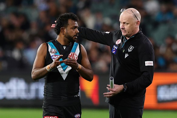Port coach Ken Hinkley (right) hopes to get Willie Rioli back for next week’s home game against Geelong.
