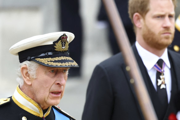 King Charles III and Prince Harry at the funeral and burial of Queen Elizabeth in September.