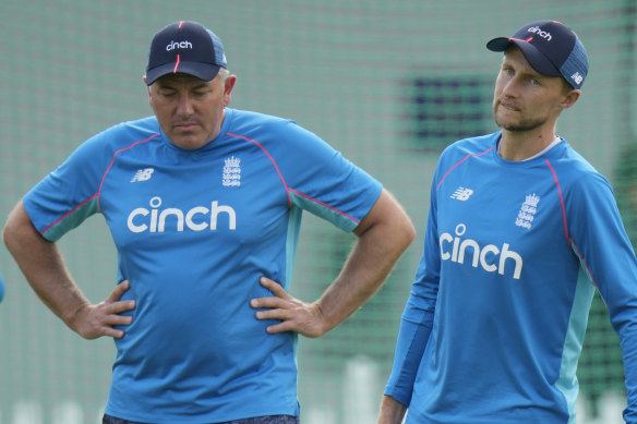 Chris Silverwood, left, with Joe Root at a practice session.