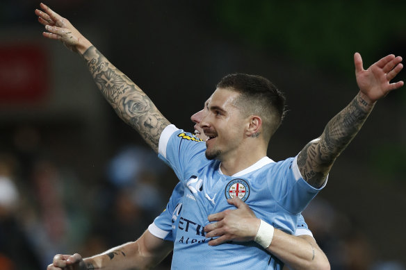 Jamie Maclaren celebrates a goal against the Phoenix. 