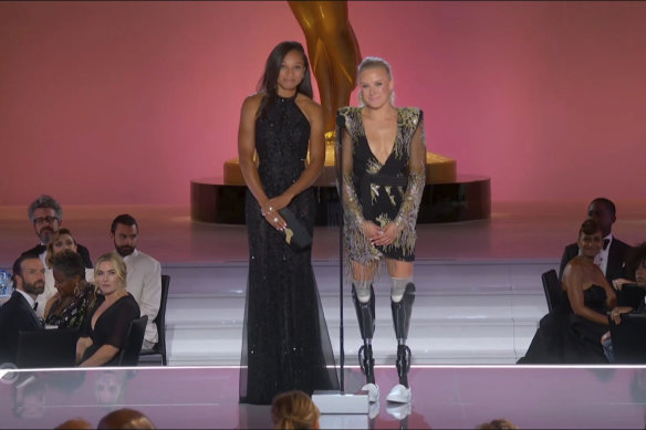 Allyson Felix, left, and Jessica Long present the award for outstanding competition program during the Primetime Emmy Awards.