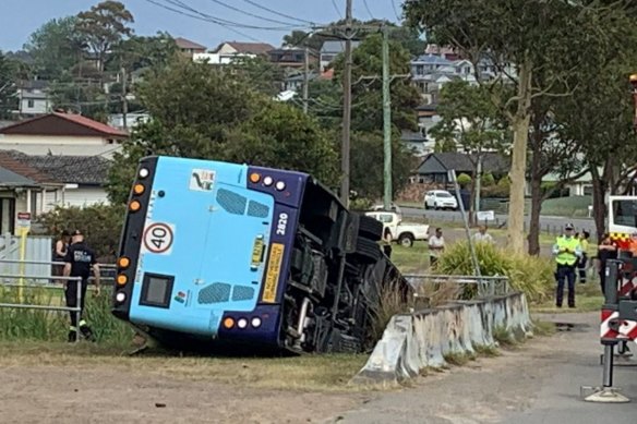 Two passengers were ejected from the bus when it crashed in the early hours of Sunday morning.