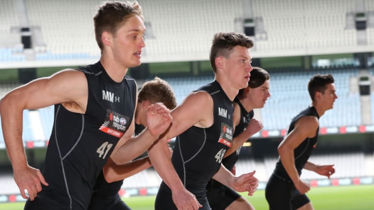 Sam Walsh  (centre) during the AFL draft combine.