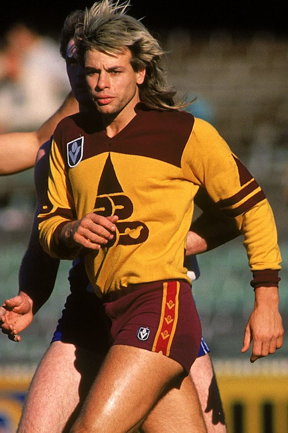 Bearing it: Capper during his short stint with Brisbane.